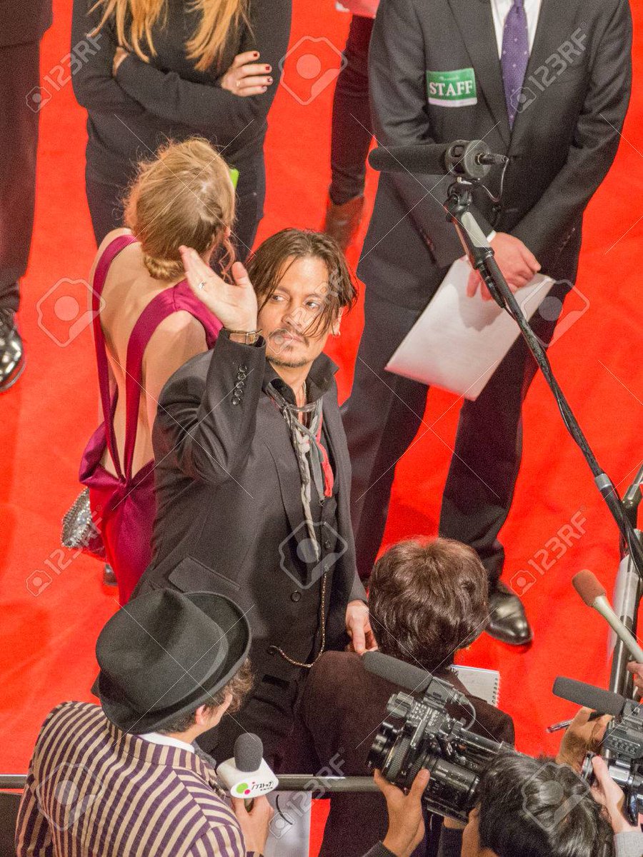 On Jan 25th 2015 Amber claims Johnny Depp knelt on her back and was hitting her, slapping her, and pulling her hair. on Jan 27 they attend the Premiere of Mortdecai in Tokyo where she wears a backless dress.