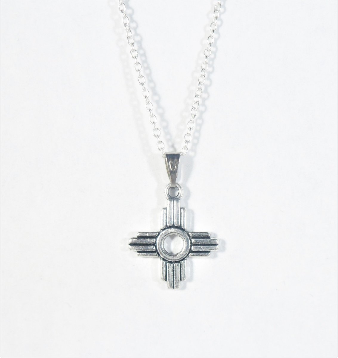 valroseshowers's tweet photo. Silver Zia Necklace - Zia Charm Pendant - Zia Earrings - New Mexico Zia Jewelry Set Southwest Style - Gift for Her under 15 - Best Sellers https://t.co/sEtkRrXeVM #pottiteam #BestSellingItems https://t.co/PJRVr79Q9G