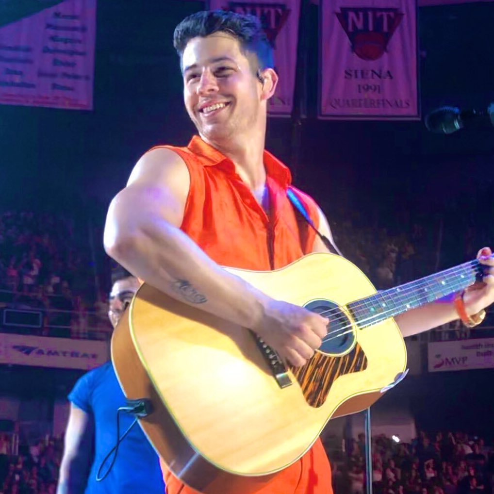 nick jonas being happy on stage a thread;