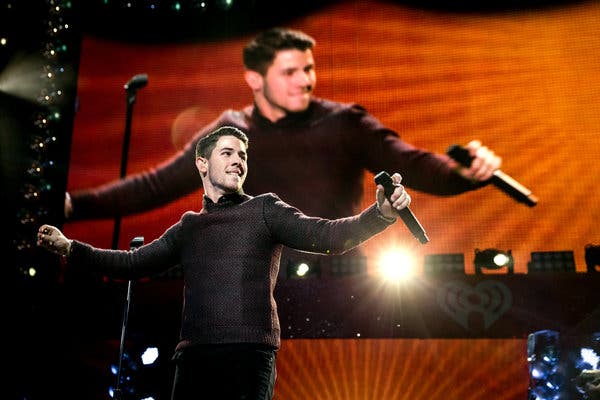 nick jonas being happy on stage a thread;