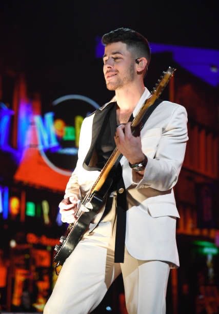 nick jonas being happy on stage a thread;