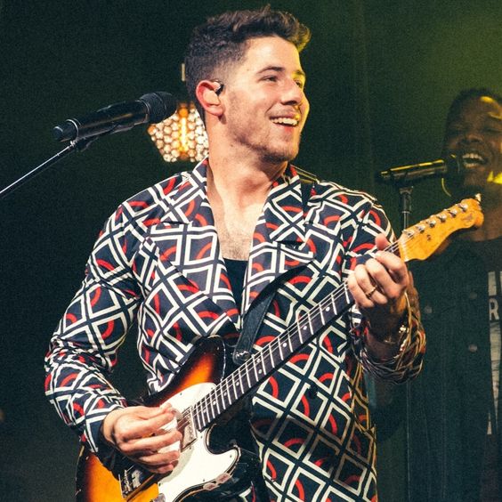 nick jonas being happy on stage a thread;