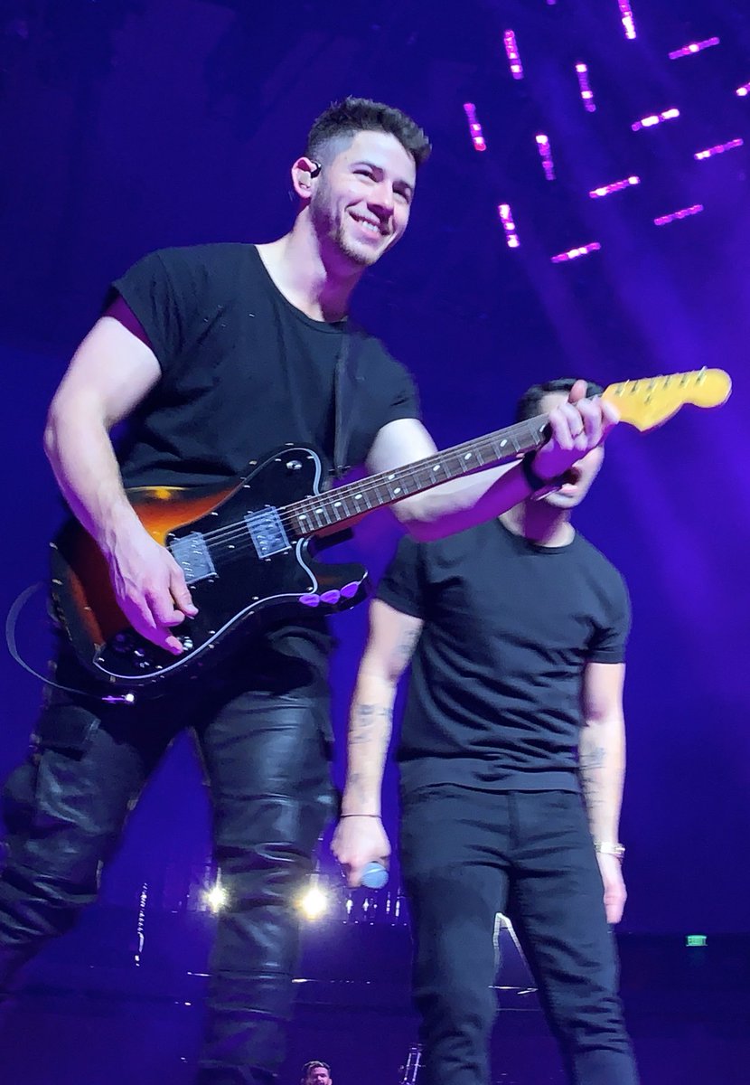 nick jonas being happy on stage a thread;