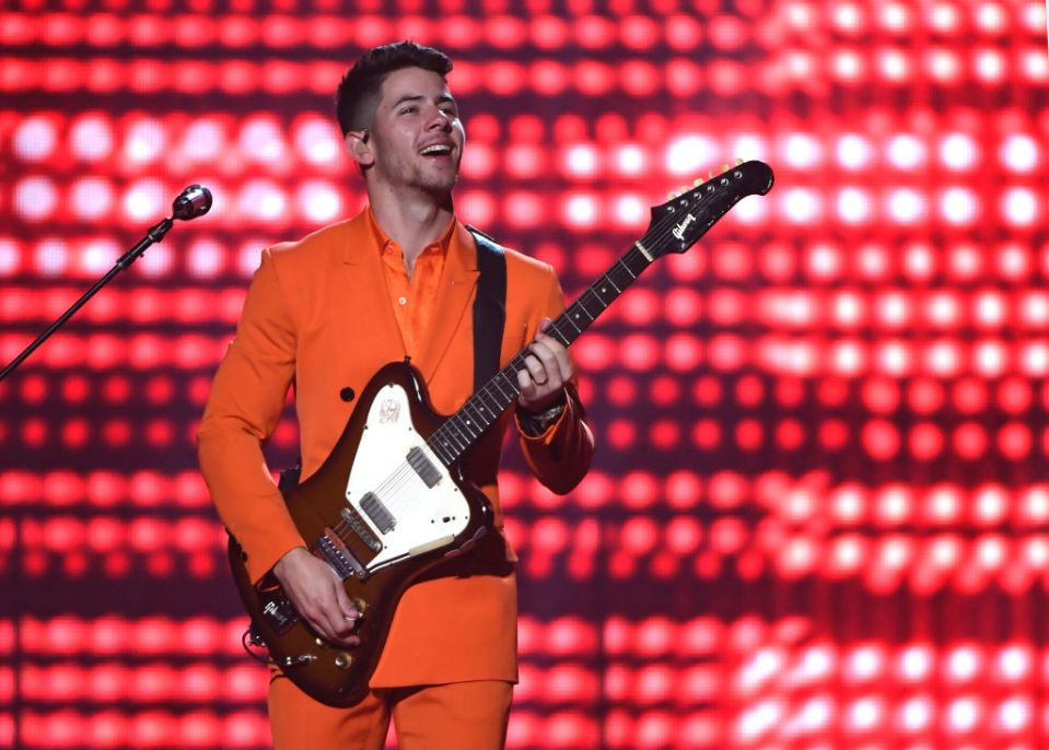 nick jonas being happy on stage a thread;