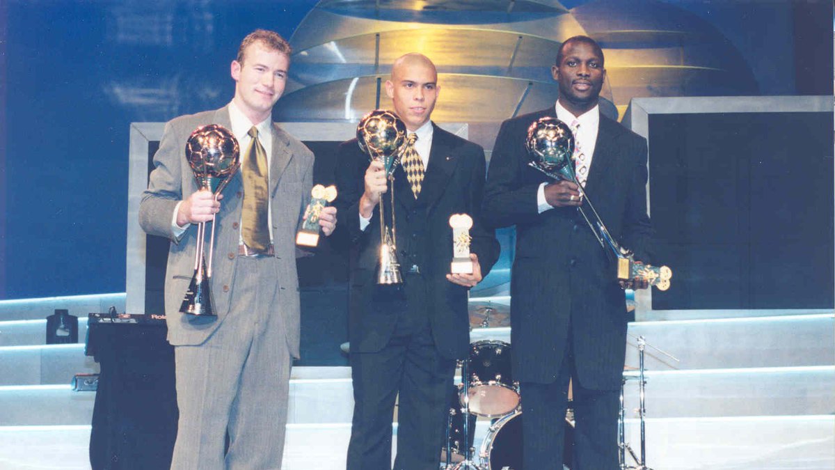 FIFAcom's tweet photo. 🥇 @Ronaldo 
🥈 @GeorgeWeahOff  
🥉 @alanshearer 

🔙 #OnThisDay in 1997 three magnificent strikers decorated the FIFA World Player of the Year podium, with a 20-year-old Fenômeno winning the award for the 1st time https://t.co/RznNfMeY8Z