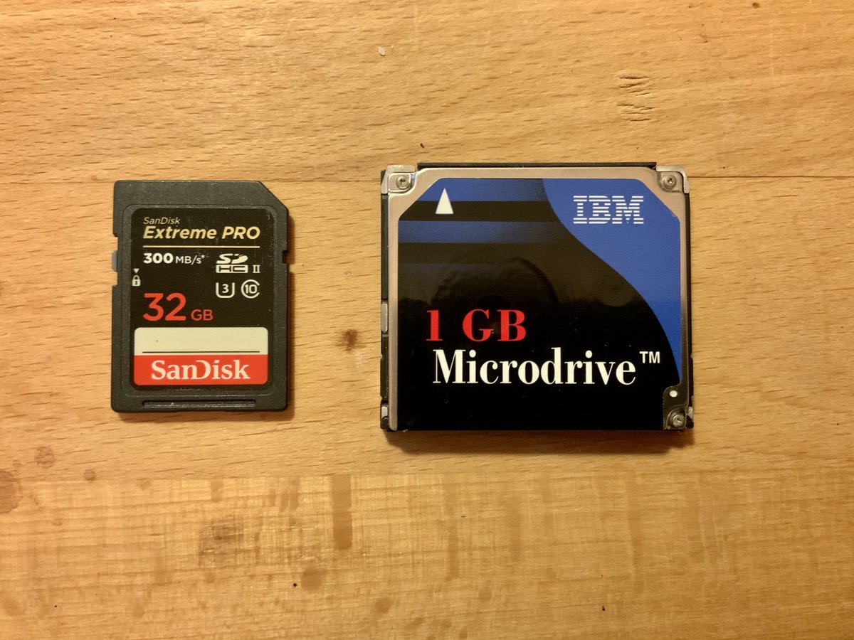 macg33zr's tweet image. Camera memory card storage tech early 2000s vs what I use today. I used to use a spinning hard drive in my DSLR back then #MicroDrive