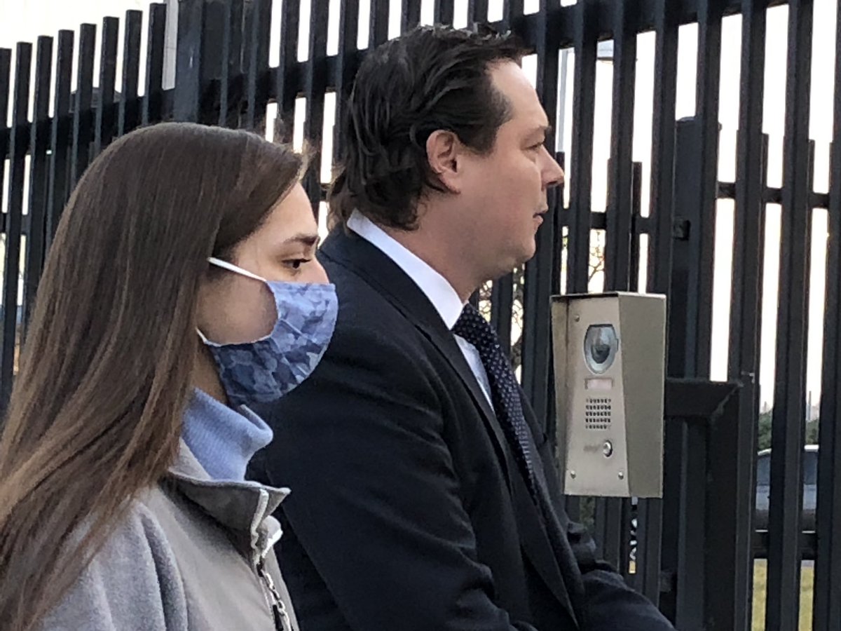 ARRESTED: Emily E. Hernandez, 21, from Sullivan Missouri surrendered herself to authorities today after stealing  @SpeakerPelosi's sign in the Capitol Riots. Shown below with her attorney, Ethan Corlija, entering the FBI building in St. Louis.  https://www.stltoday.com/news/local/crime-and-courts/franklin-county-woman-in-capitol-riot-to-turn-herself-in-to-fbi/article_6f102a69-a42e-532f-b2cd-bb98c50fbca8.html