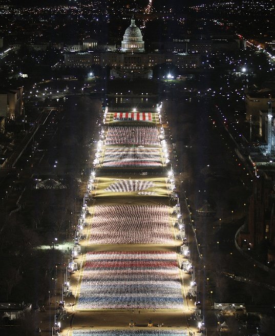 TimRunsHisMouth's tweet image. Remember when the left mocked Trump for his inauguration crowd?  

Wellp... Biden's is an empty space with flags inside a security zone.