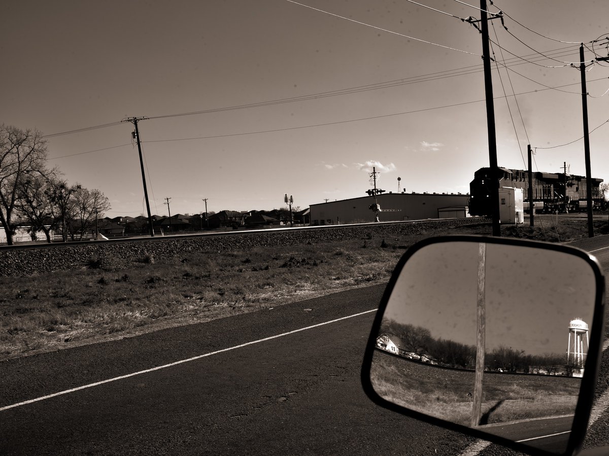 ZachZer0's tweet photo. One eye forward , always pays off have a look back. 
@officialcsx
@pondertexas @csx_train_photography @texashighways #trivial @photography #art #image #offthemap #littletown  #texas #reflection #photo #image #sepiaphotography  #sepia #mirror #carmirror  #drivingphotography https://t.co/bUDtuVYkay