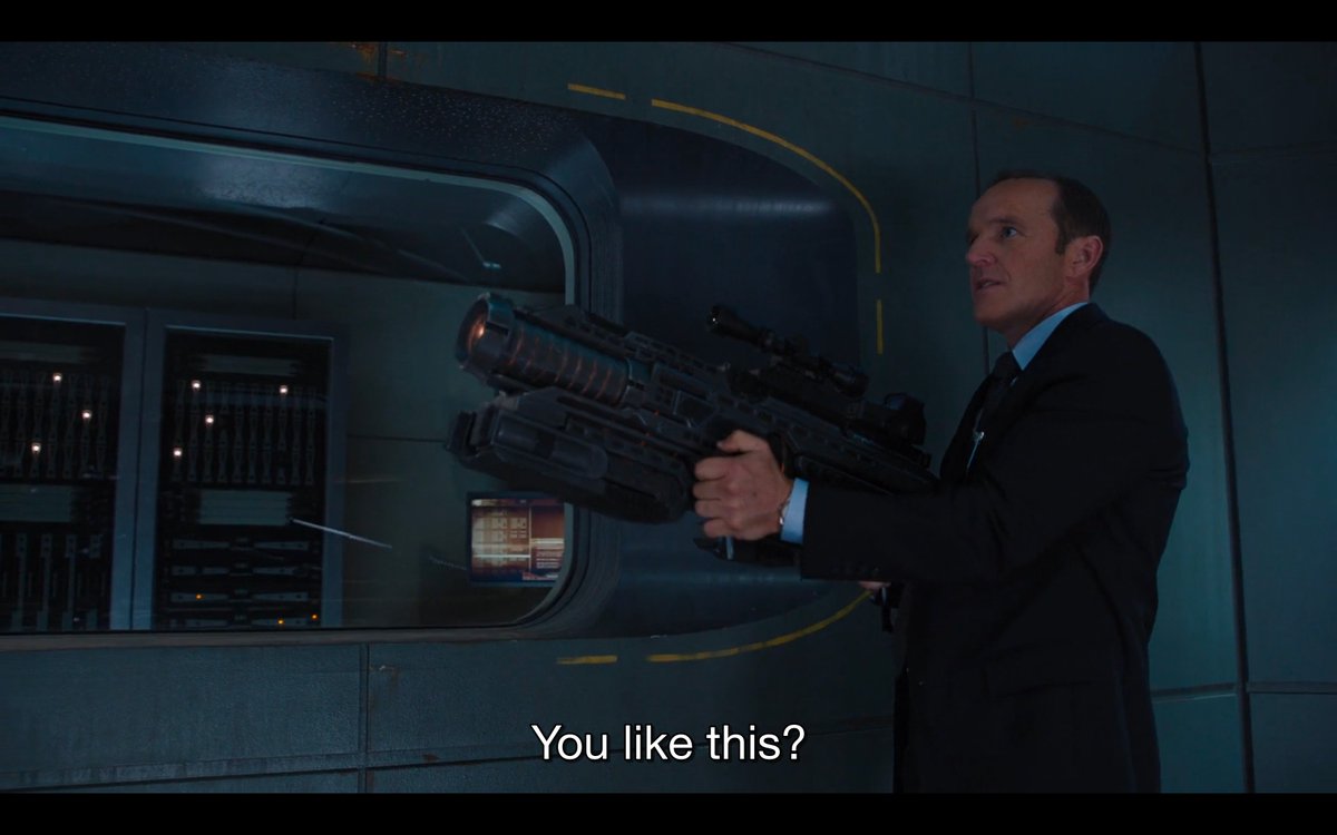 Normal humans in the MCU (who aren't super, per se) use guns to try to match strength with super beings. Coulson uses a futuristic firearm. Natasha, Clint, and Maria use Glocks. Fury uses an RPG etc. Guns continue to be framed as both badass and an effective way to project power.