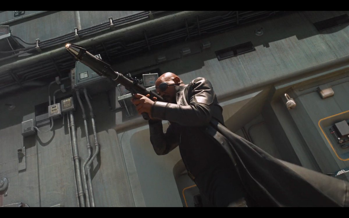 Normal humans in the MCU (who aren't super, per se) use guns to try to match strength with super beings. Coulson uses a futuristic firearm. Natasha, Clint, and Maria use Glocks. Fury uses an RPG etc. Guns continue to be framed as both badass and an effective way to project power.