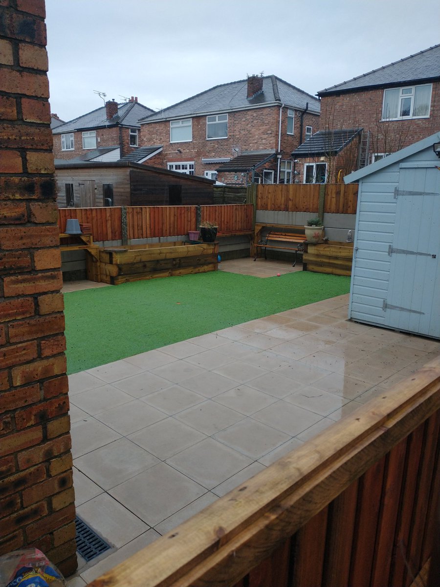 I'm not saying next door's hard landscaping has had an effect on drainage but...