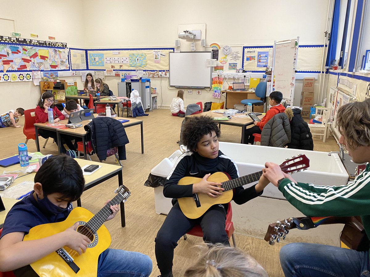 LorneSchool's tweet photo. An afternoon of exploring @HomeCourtai on our iPads, joining class calls and some guitar lessons in the Lorne hub this afternoon! A very busy day for all! 🎸 #TeamLorne https://t.co/e8tUFop8wx
