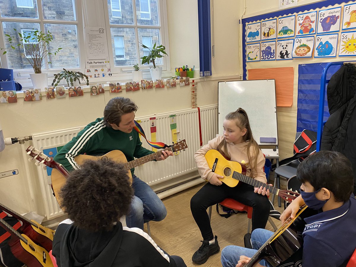 LorneSchool's tweet photo. An afternoon of exploring @HomeCourtai on our iPads, joining class calls and some guitar lessons in the Lorne hub this afternoon! A very busy day for all! 🎸 #TeamLorne https://t.co/e8tUFop8wx