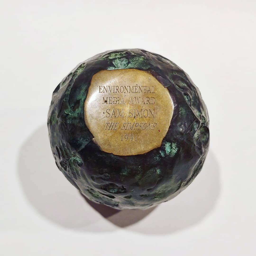 springfield_ont's tweet photo. One of the more unique items in my collection. This EMA was won by Simpsons co-developer, Sam Simon back in 1991, in the category of 'Television Episodic-Comedy' for the episode, 'Two Cars in Every Garage, Three Eyes on Every Fish'. @TheSimpsons #award #classictv #environment https://t.co/HOc6nQdiQR