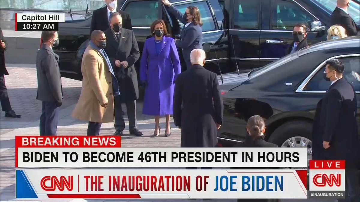 PodSaveAmerica's tweet image. Here is now-Acting Deputy House Sergeant At Arms Eugene Goodman, escorting VP-Elect Kamala Harris. #InaugurationDay