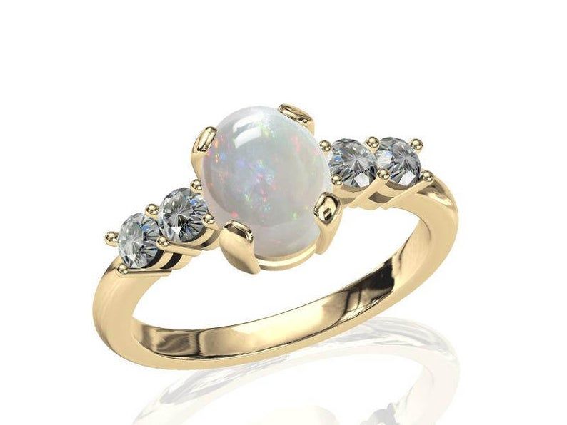 AndersonBeattie's tweet photo. Grab this unique black opal ring perfect for those wanting something different for their engagement ring. 😊✨ #opal #jewelry #AndersonBeattie #etsy https://t.co/kouKfUfxXB https://t.co/vMmDKjzD64