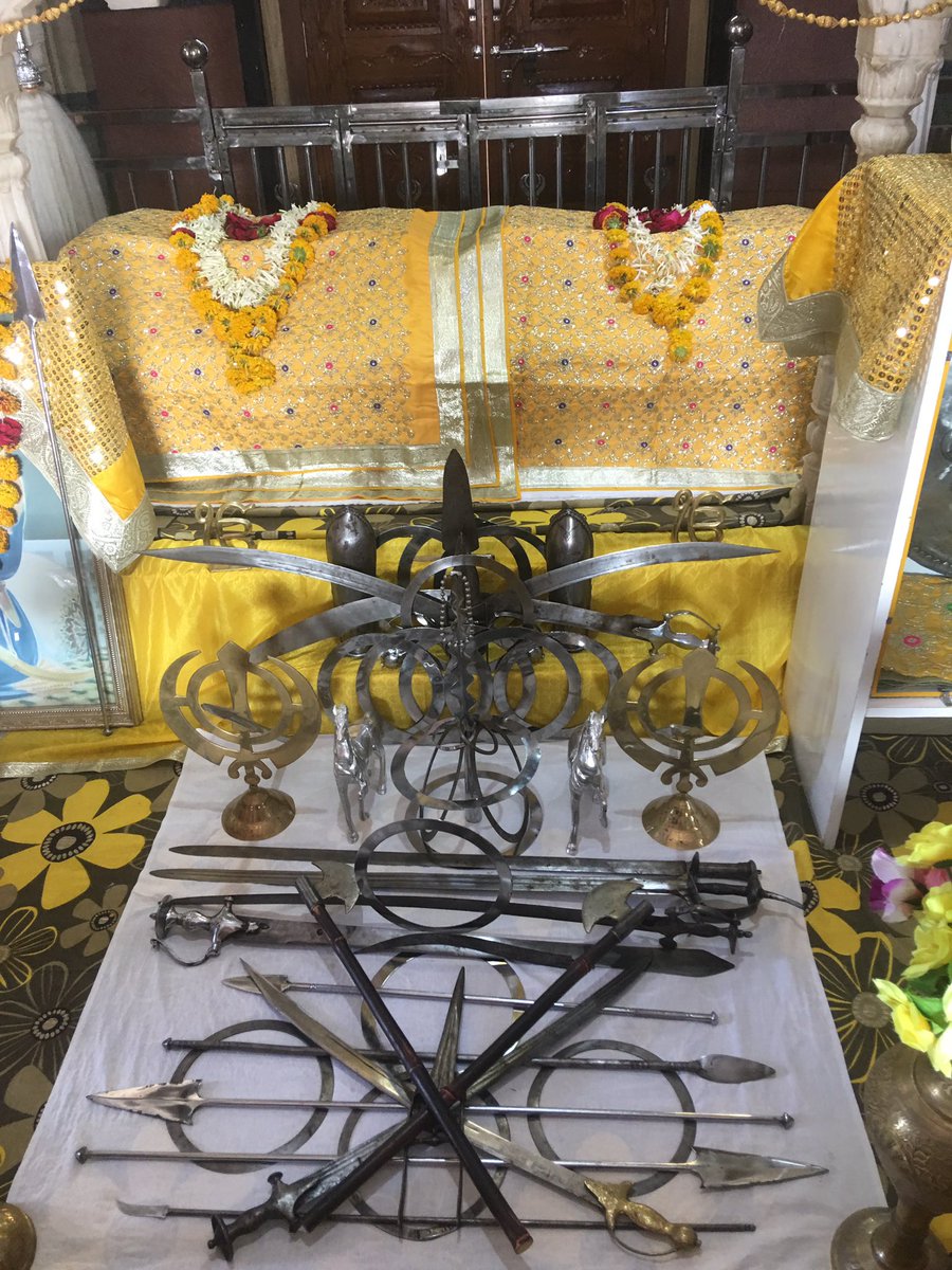 times of Guru Nanak Dev Ji Maharaj. They went, dug the treasure and brought here back on bullock carts. The treasure was distributed to the army generously, not in counted numbers but in shieldfuls. The shield they used to distribute the treasure can be seen here.