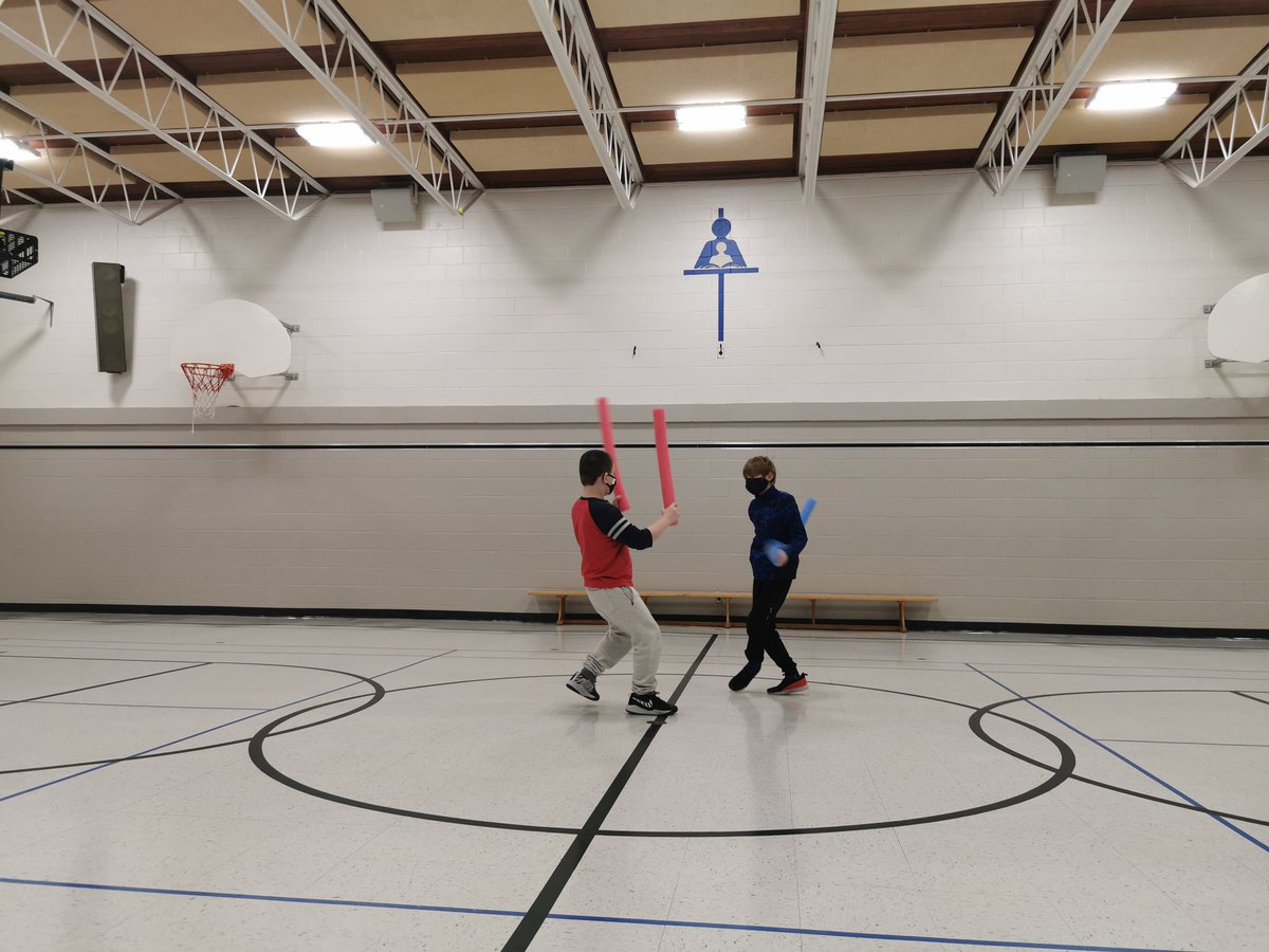 ChristineMess20's tweet photo. On Wednesday's we focus on #wellness @stlukercsd. These two have channeled their inner Star Wars and developed a strategic game that focuses on movement, self-control, distance and sportsmanship. #wetheresilient @RCSD_No81 #creativity #physicaleducation https://t.co/pLu0vLXKtS