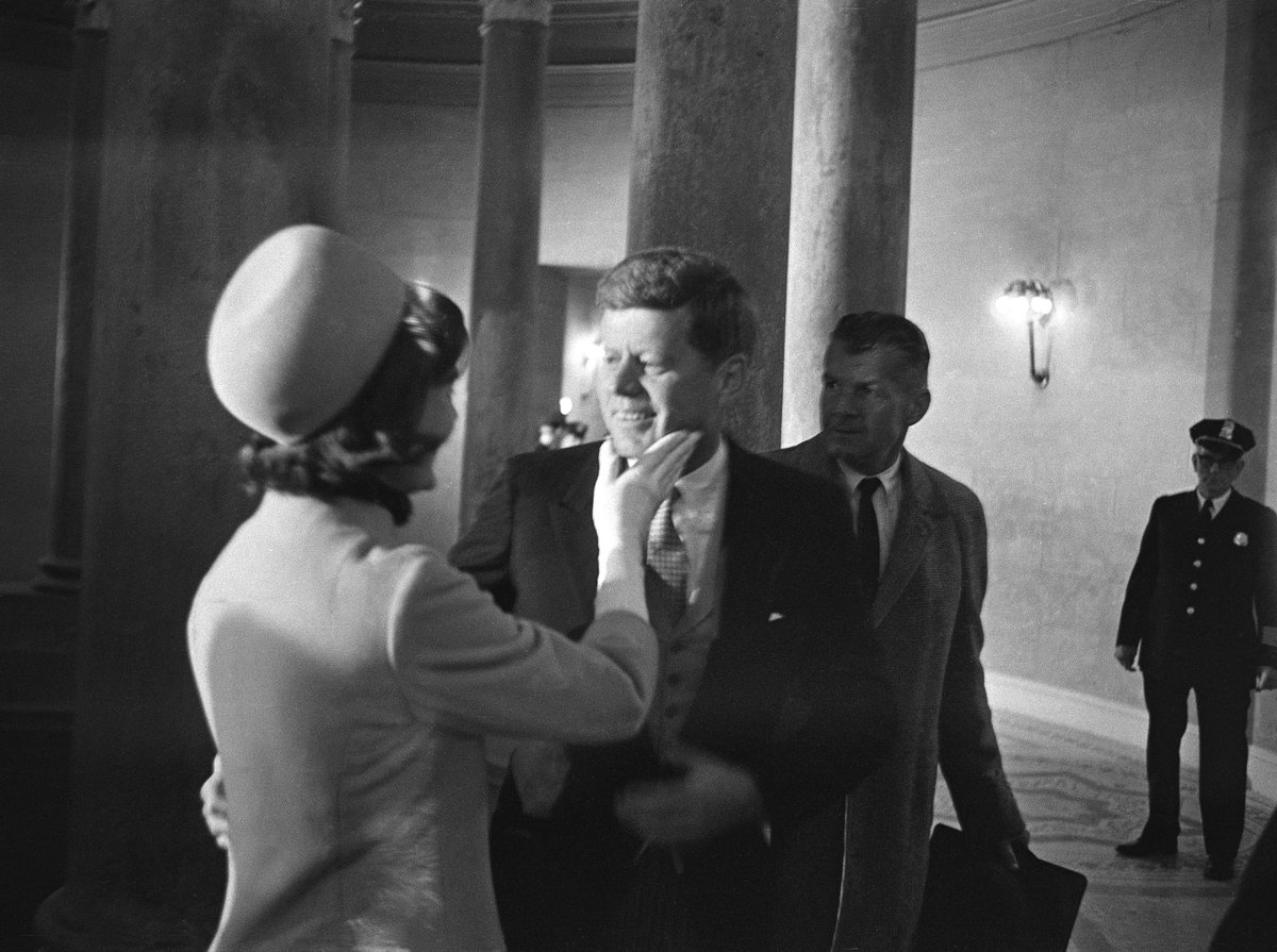 Jacqueline Kennedy took part in two inauguration ceremonies for two different presidents.She shared the first with her husband, John F. Kennedy — here’s a tender moment from right after he was sworn into office in 1961. (AP/Henry Burroughs)