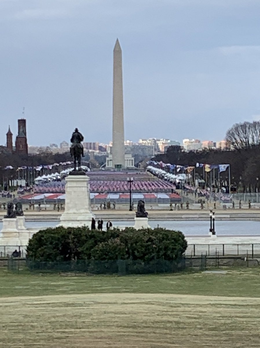 DanMulhall's tweet photo. The view from the #USCapitol down the National Mall which would normally be crowded on #InaugurationDay. Now 200,000 flags represent the people who cannot be there today because of #COVID19. https://t.co/6jNdLvJ2xG
