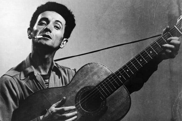 Let's start with the fact that she sang a folklore song written by the communist sympathizer Woody Guthrie; a song that's often sang in socialist and leftist meetings. Now at the inauguration!