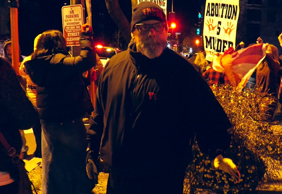 Leading the QAnon protest at Comet Ping Pong last night was Ruben Israel, a far-right Christian preacher from California who is known for hosting hate rallies around the U.S. that target LGBTQ people and Muslims.