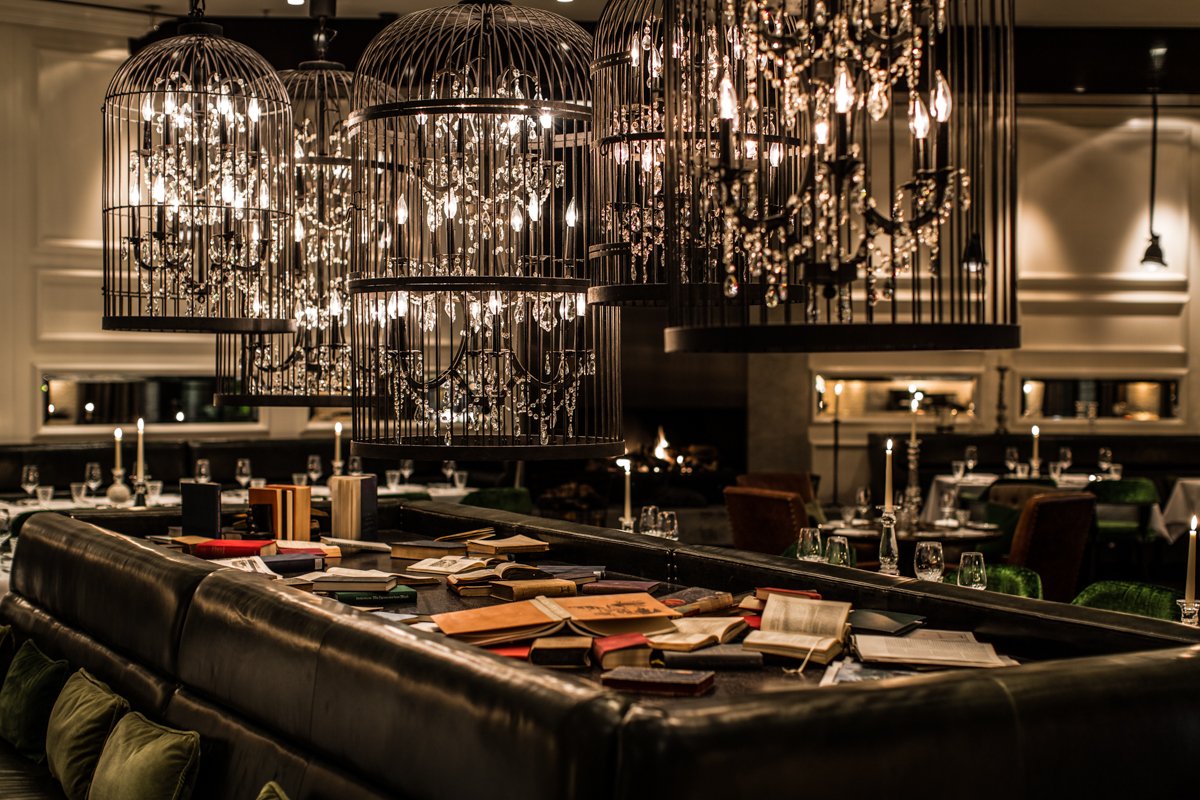 The GRACE Restaurant in <a href="/HotelZooBerlin/">Hotel Zoo Berlin</a>  is a return to Hollywood glamour with interiors by Powerstrip Studio. The chandeliers contained in extravagant bird cages add a quirky atmosphere above George Smith bespoke banquettes. #georgesmithfurniture #hotelzoo #powerstripstudio