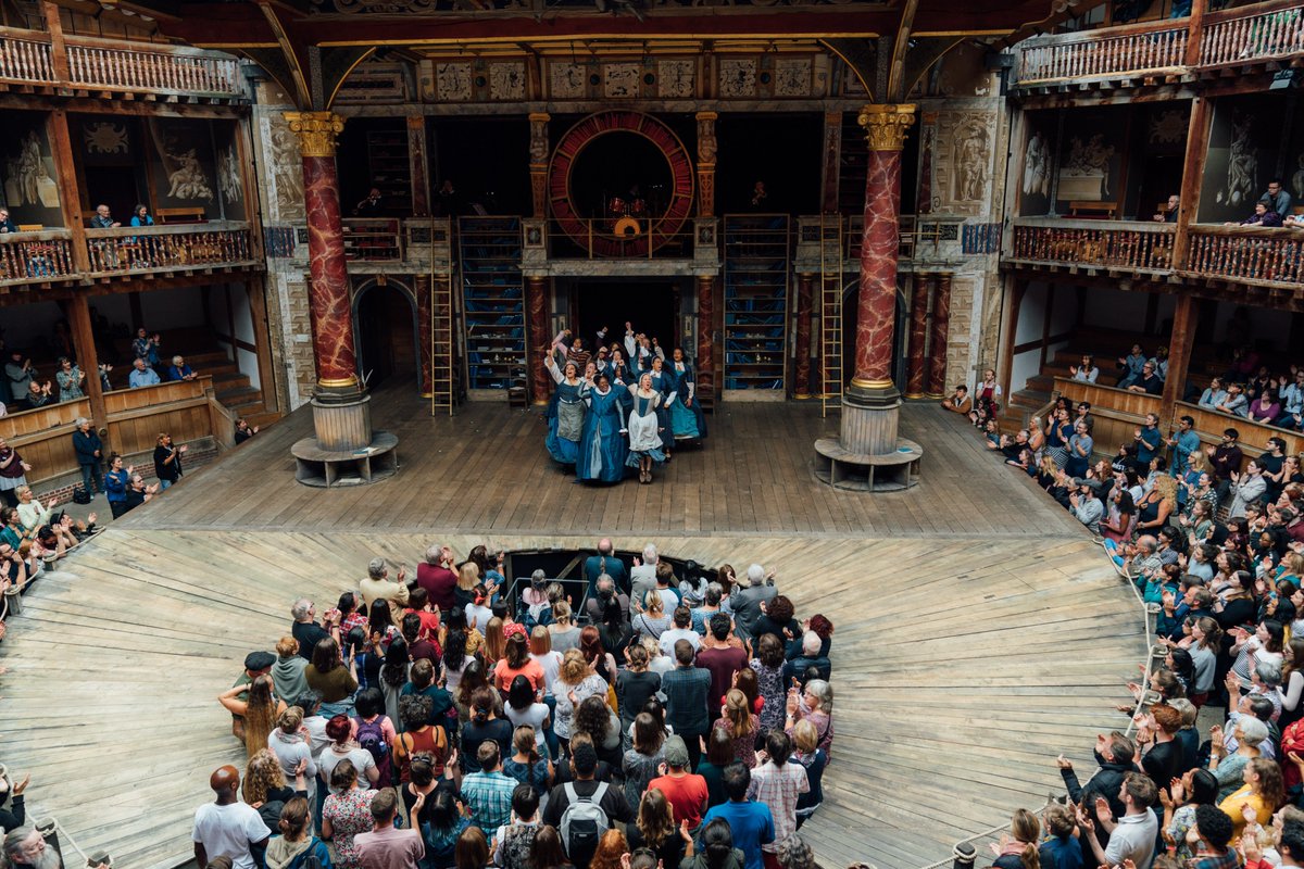 The_Globe's tweet photo. @NationalTheatre Oooof, so so many. But @JoannaScotcher's design for #Emilia was 🔥💙.  The thrust stage reaching out into the Yard (like a lovely set of arms embracing our Groundlings), an ⭕ of books, the red books slowly being replaced by blue books, and the beautiful Elizabethan costumes... https://t.co/37Dd9Bht2r