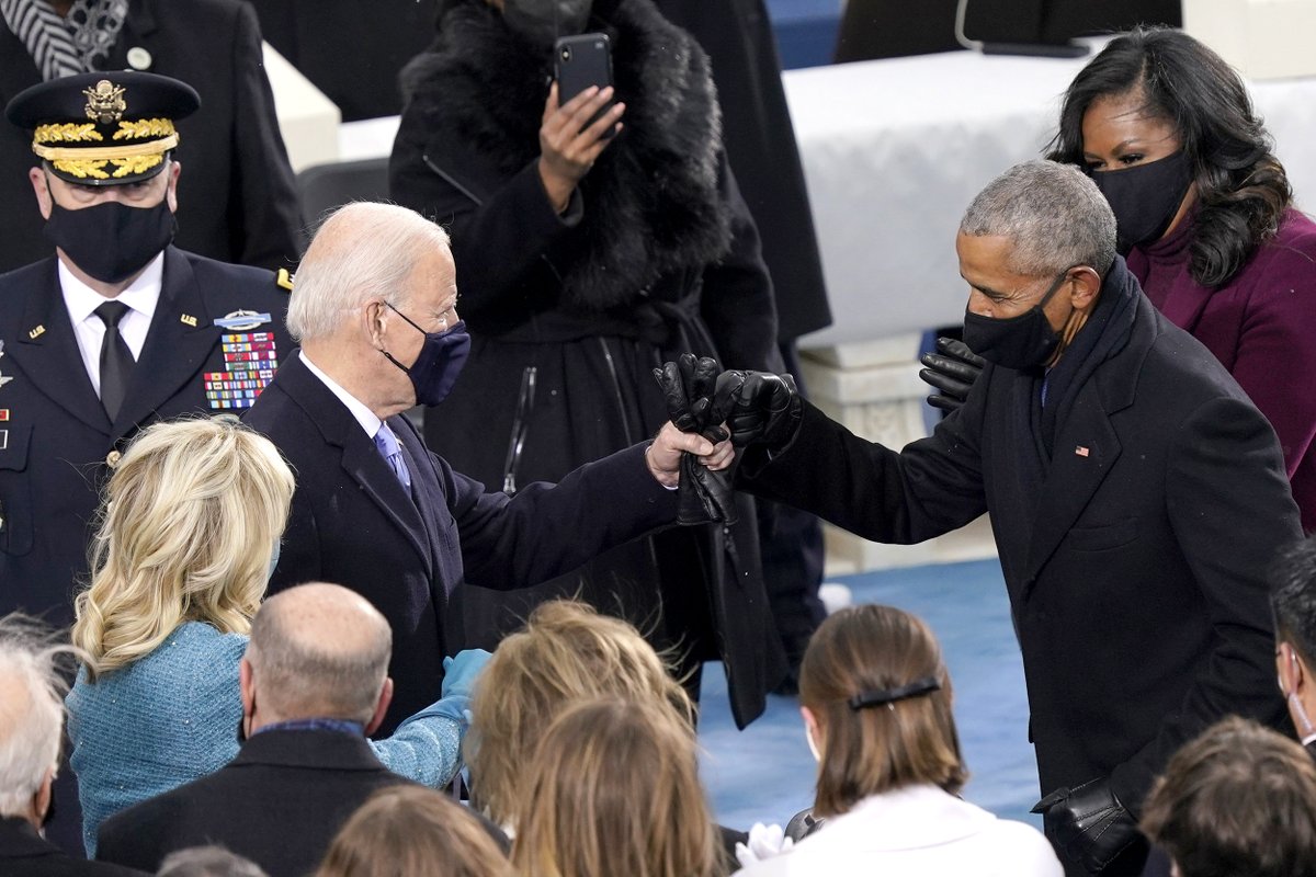 President-elect Biden, set to be sworn in as 46th president of the United States, bumps fists with former President Obama. 

📷 Win McNamee / Getty