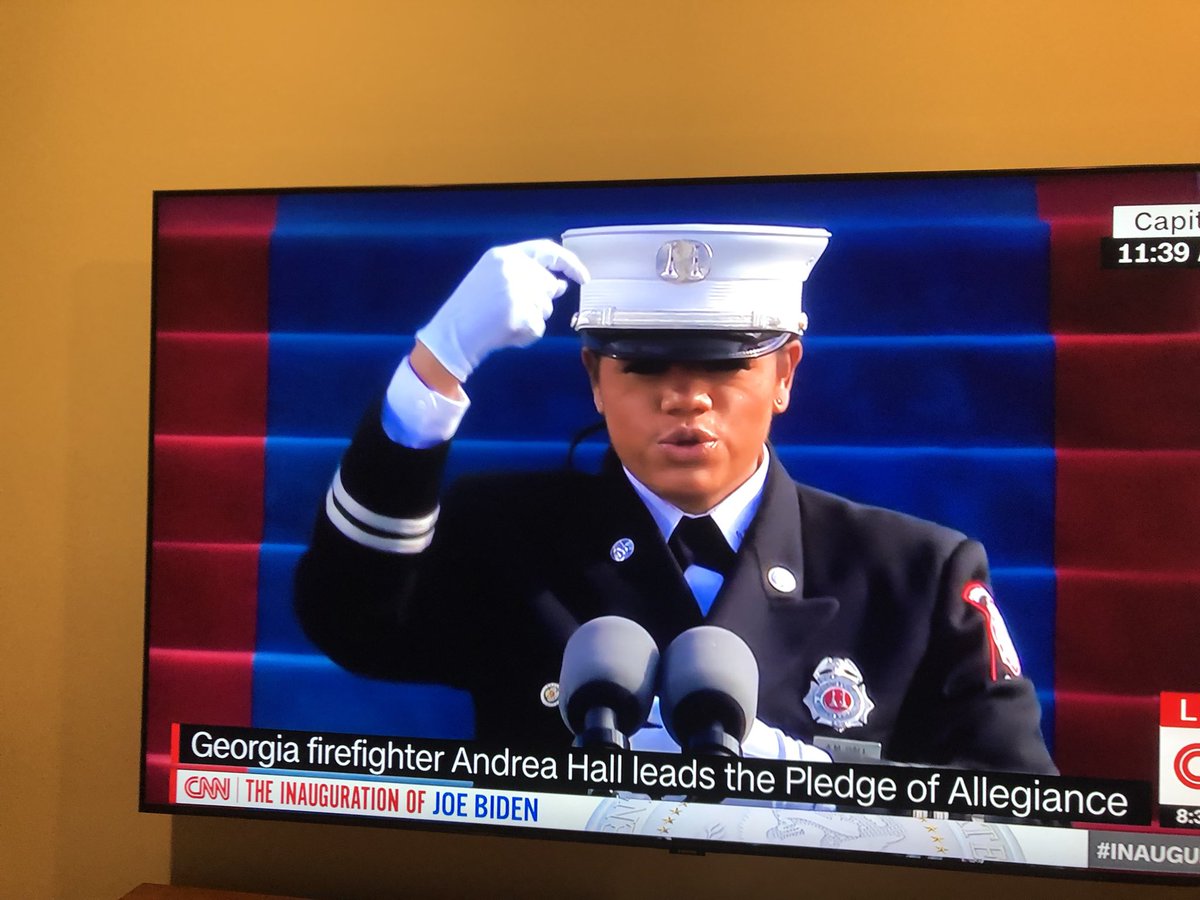 Who could top Gaga? The first black female fire captain in the US, who both speaks and signs the Pledge of Allegiance