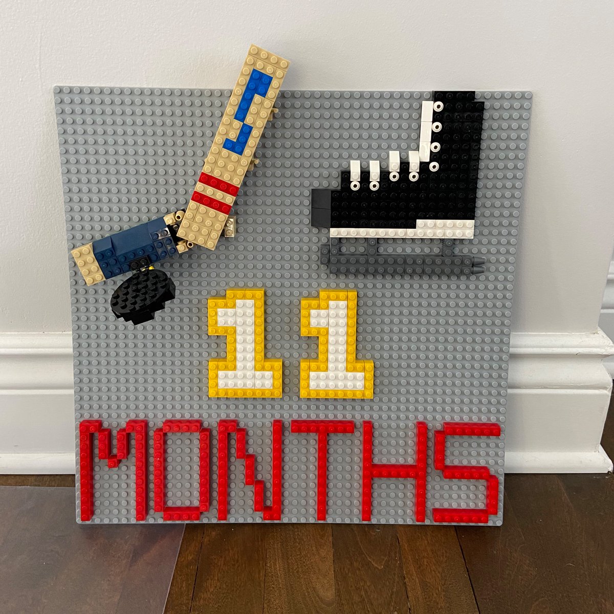 Ewener's tweet photo. Celebrating my son’s 11 month with a hockey themed sign @FlaPanthers @JonnyHuby11 https://t.co/Vou7D6aJjN
