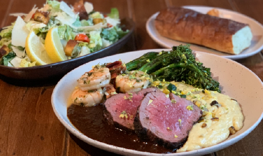 Looking to step up this weekend?  Try the Asado Surf and Turf kit.  Grilled filet mignon, prawns in garlic butter sauce, rosemary fig demi glacé, creamy poblano polenta, grilled⁠
seasonal vegetables, choice of salad, Macrina potato baguette and chimichurri butter.