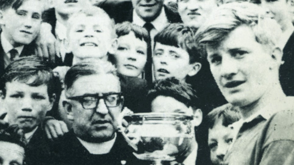 KK Kenny accepted the Sean Robbins Cup for  @strynaghs in 1965, beginning a fantastic run of success for the Banagher-based club. St Rynagh's have won the Sean Robbins Cup on 18 occasions and are, of course, the reigning champions.
