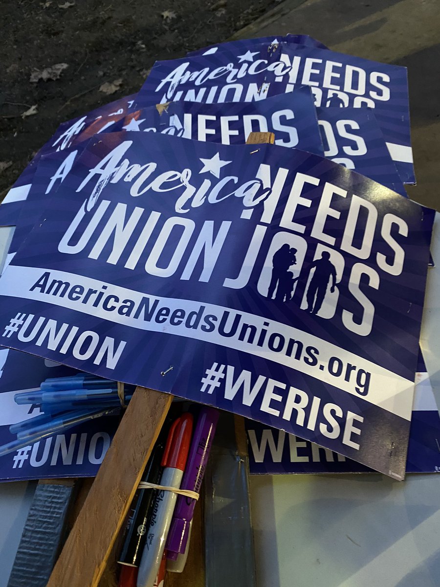 A number of organizations have tables set up for people, so that they can spread their message and increase support. One of these groups is a local labor union of hospital and sanitation workers.
