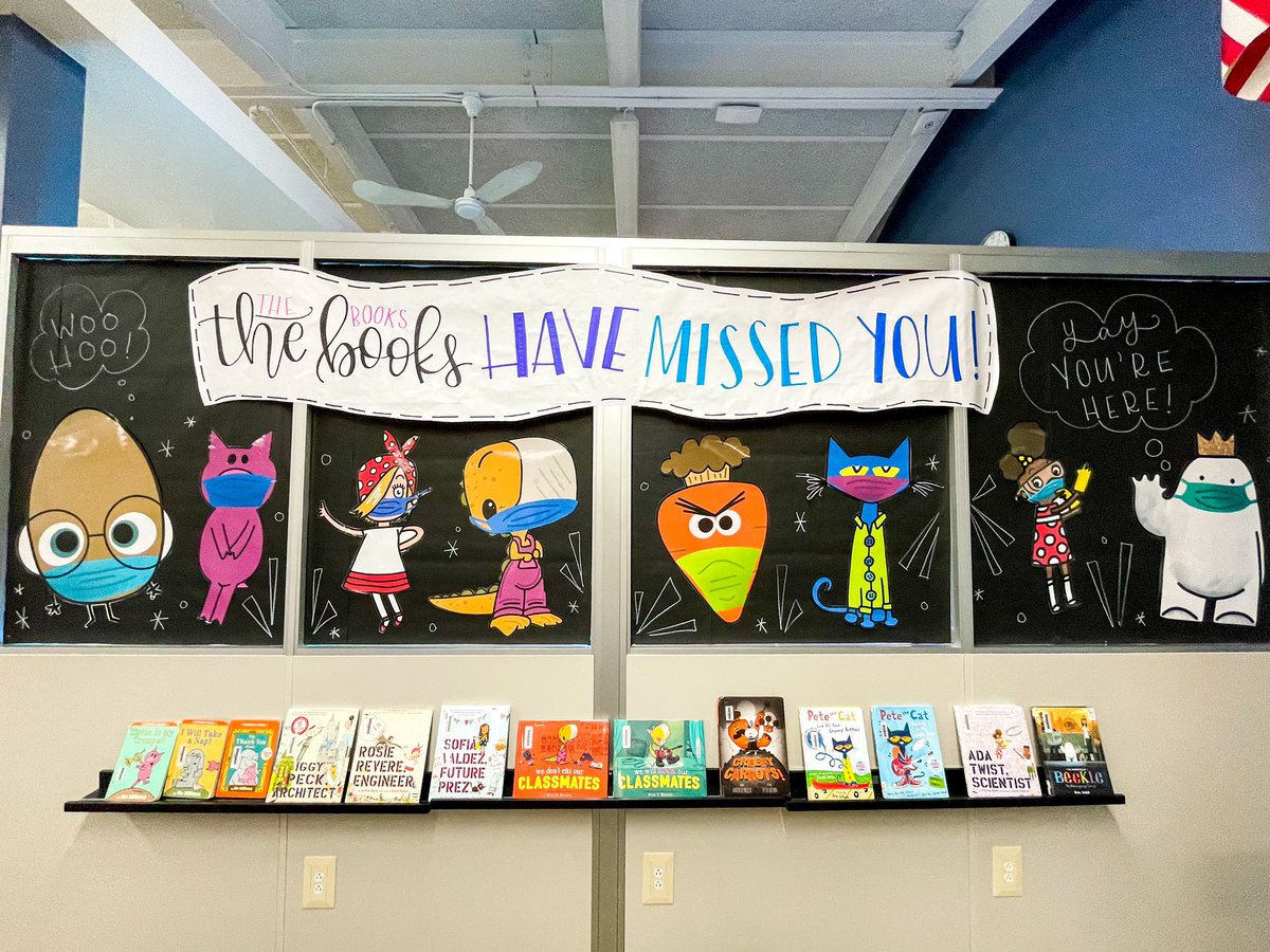 Some friendly (masked) faces are ready to welcome our kids into the building next week - MUSTANGS, THE BOOKS HAVE MISSED YOU! #203unites #librarylife