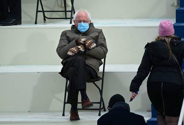 audience members waiting for judges to come on stage with scores like