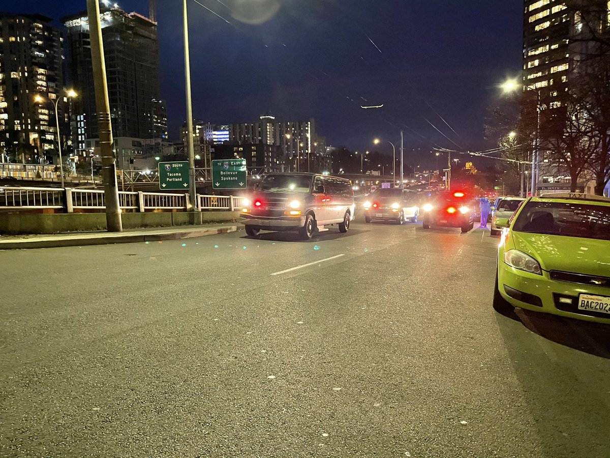 In Seattle, a group of about 150 protesters in black bloc burned an American flag outside the immigration court on 2nd Ave, smashed a window at the Amazon Go. Police are now trailing.