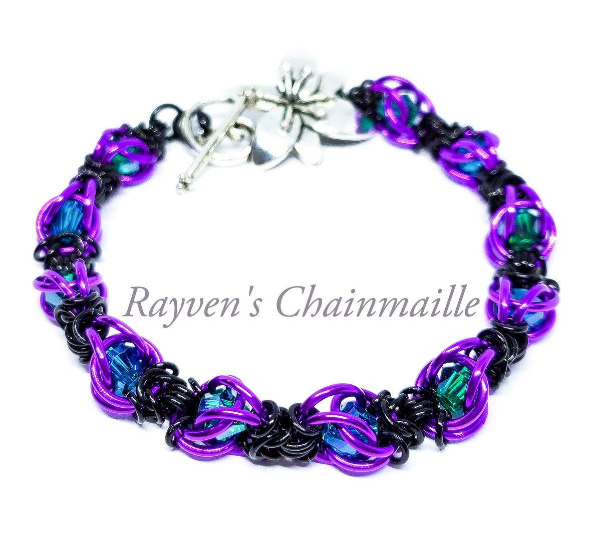 Captured Crystal Chainmaille Bracelet in black, violet, and teal!

rayvenmaille.com/collections/br…

#blackjewelry #violetjewelry #tealjewelry #handcrafted #handcraftedjewelry #smallbusiness