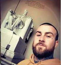 Jorden Mink, 27, from Oakdale, Pennsylvania climbed through a broken window of the U.S. Capitol building, taking a chair from inside and smashed a window with a baseball bat.  https://triblive.com/local/feds-oakdale-man-stormed-capitol-with-baseball-bat-stole-chair/