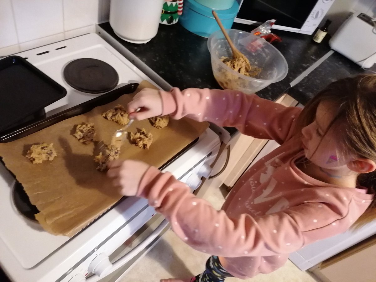 HDenew's tweet photo. @FoxHill_Primary #CoxellsKitchen Eloise in year 3 made some delicious chocolate chunk cookies. She is enjoying them. https://t.co/snQ6tSNF5A