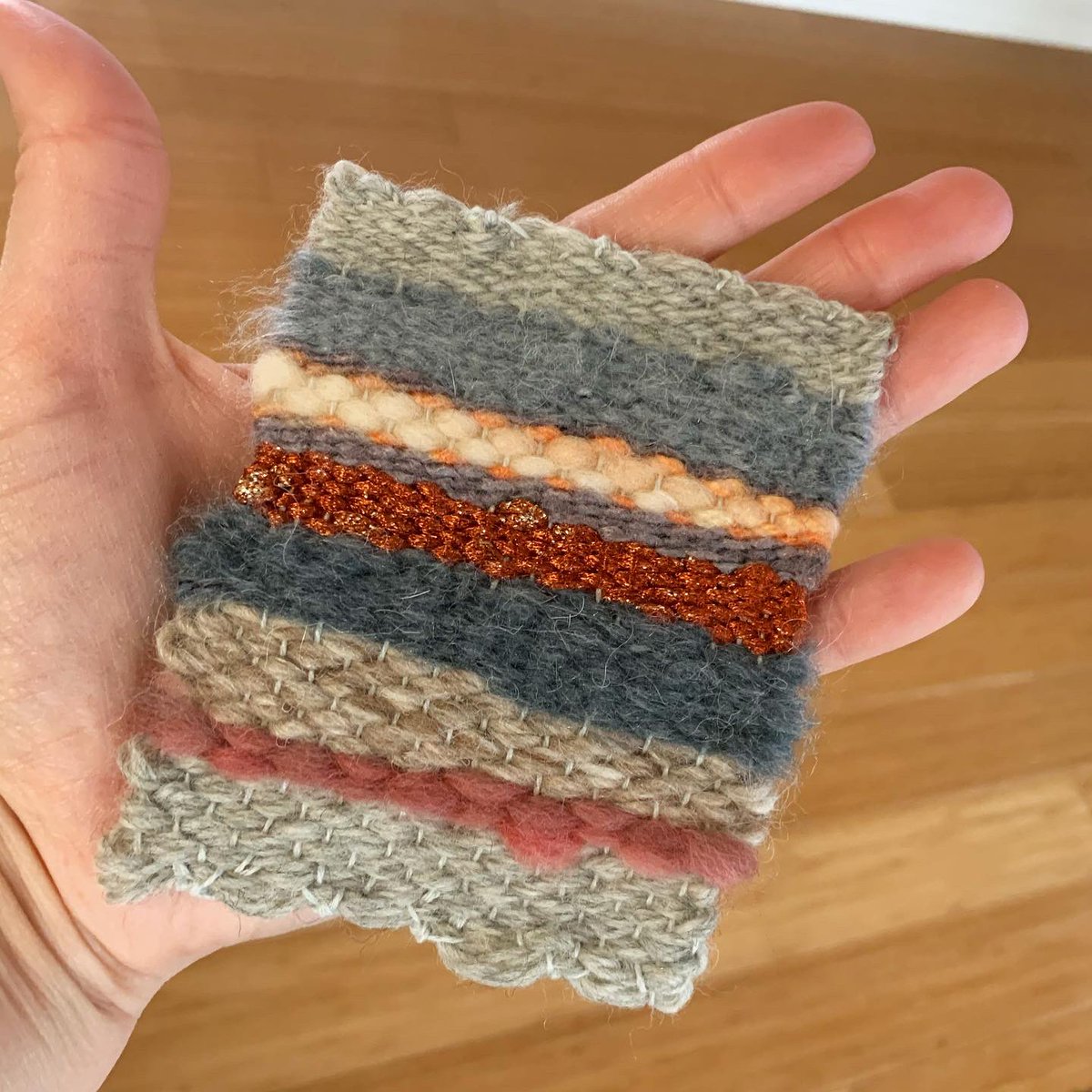 designs_emily's tweet photo. Small woven piece to frame or hang from my mini handheld loom. #weaving #weaver #frameloom #loom #miniloom #textiles #textileartisan #fiberarts #wool #yarn #ewhd https://t.co/LegG72V4DU