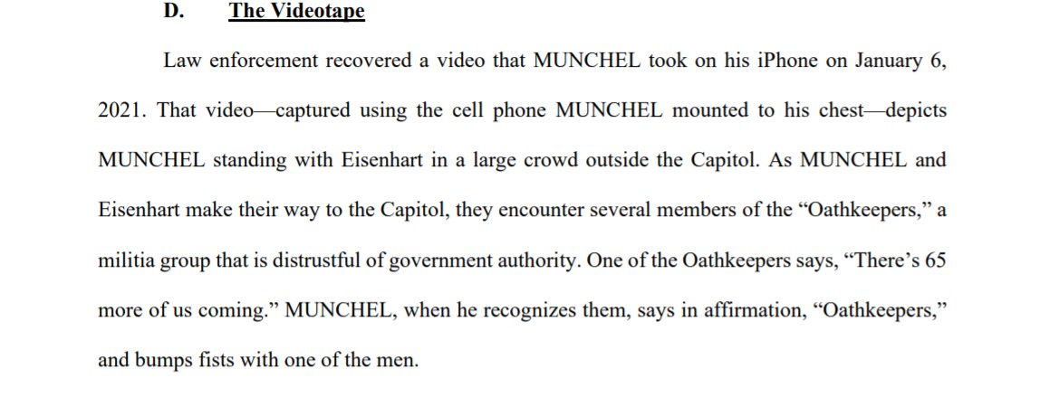At one point, the video shows Munchel, who broke into the Capitol w/his mom, encountering a group of Oath Keepers inside the building. One of the Oath Keepers tells him, “There’s 65 more of us coming.”Munchel gives him a fist bump.