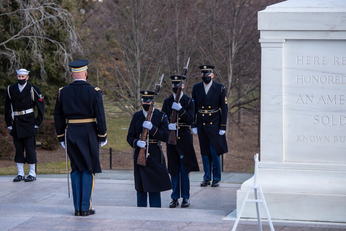 USArmyOldGuard's tweet photo. President Biden's first official act was to honor the fallen with a wreath at the Tomb of the Unknown Soldier @ArlingtonNatl. The Old Guard has kept the vigil every second of every day for 73 years. #AmericasRegiment https://t.co/tgS2mv2xTe