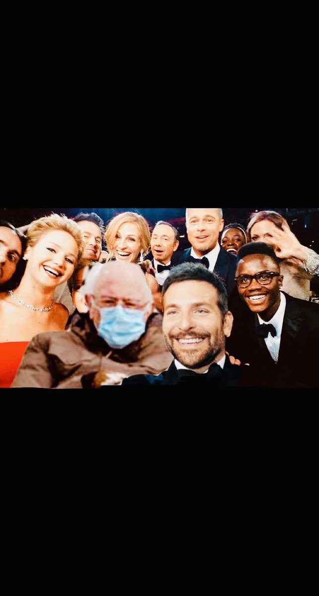 Sculleybones's tweet photo. Bernie Sanders wearing a mask at the 2014 Oscars. One of the lads. Ahead of his time. #BernieSanders https://t.co/66CCyw8kmC