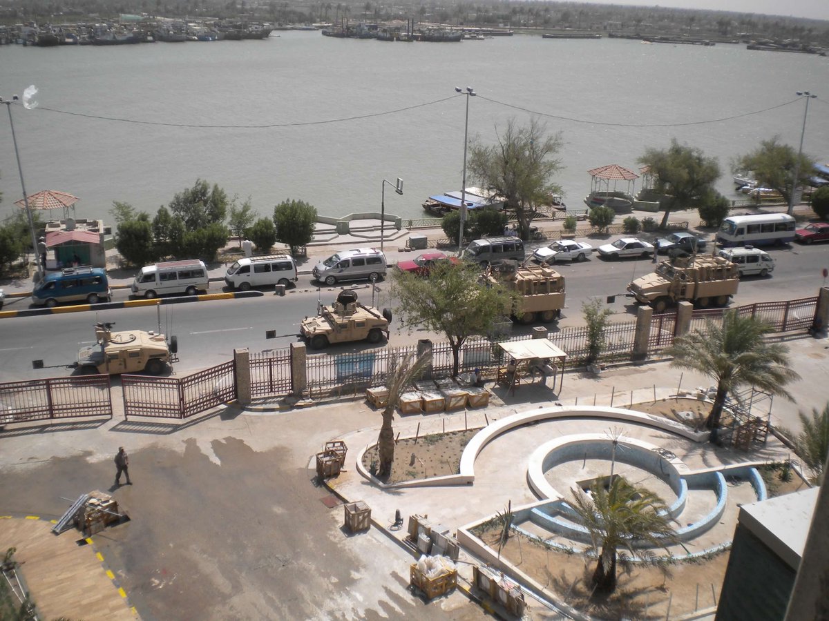 Military movement in downtown Basra, 2010.  Read about the waning days of the Iraq War in my book 