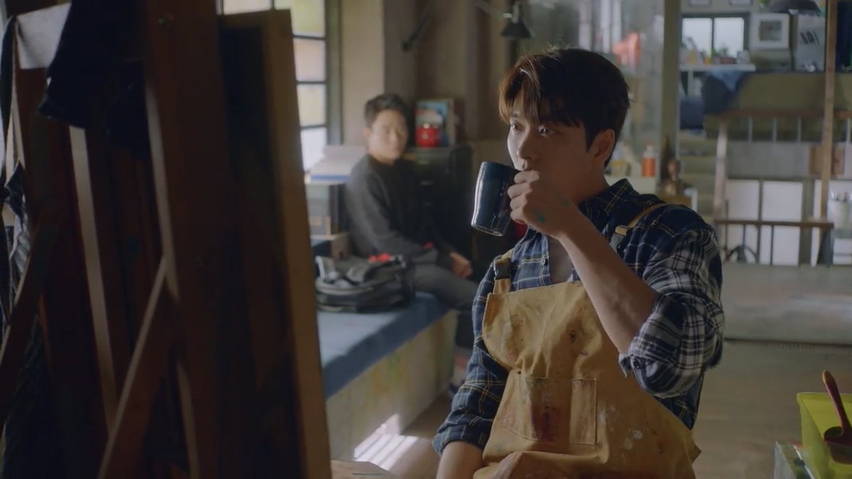 the first time we see yejun, he sits down on the couch and gazes at yeonghwa painting from a short distance