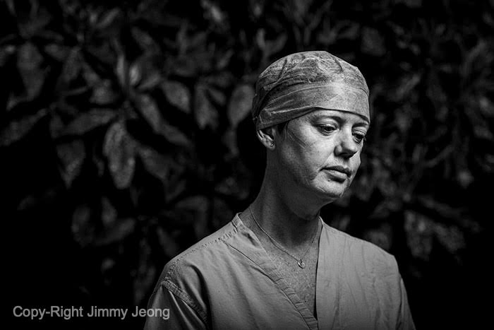 Freelancer  @jimmyshootz petitioned for a month to tell the story of the hardworking frontline workers. In the end he was allowed to set up in a courtyard and made his portraits—including exhausted nurse Robynne Peters. Her own mother passed away from COVID-19.