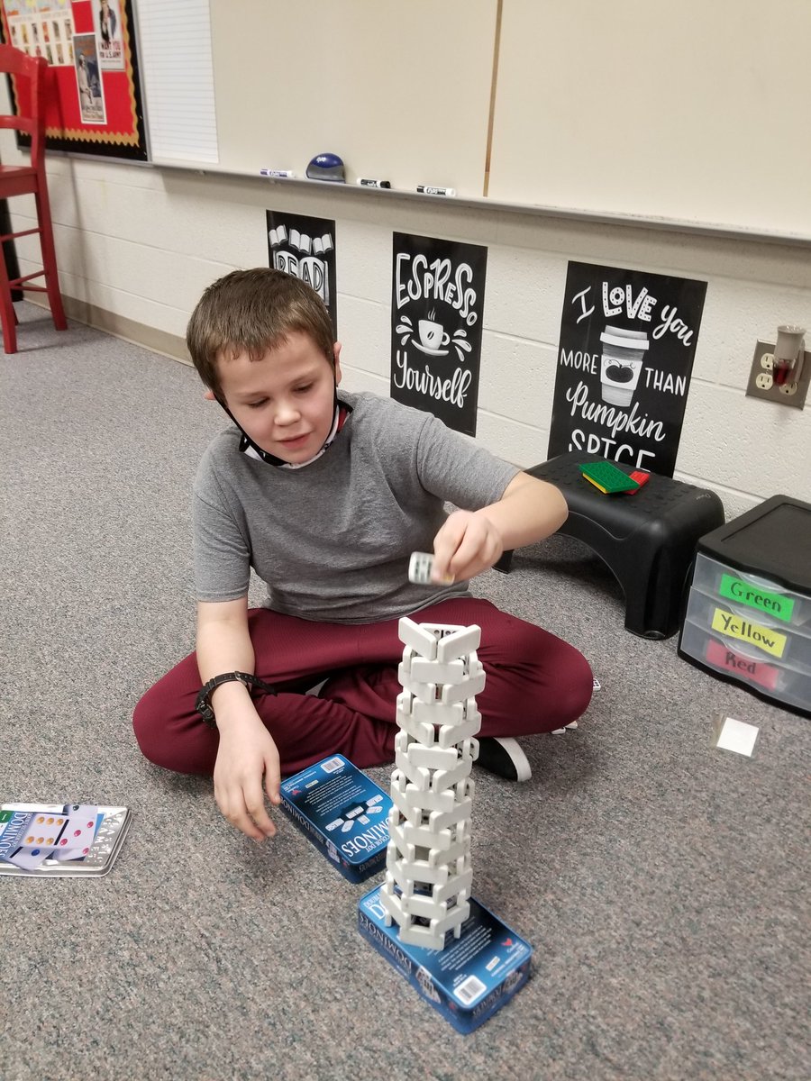 My sunshine on a cloudy day!  He loves dominoes during inside recess.  #whataboy #original