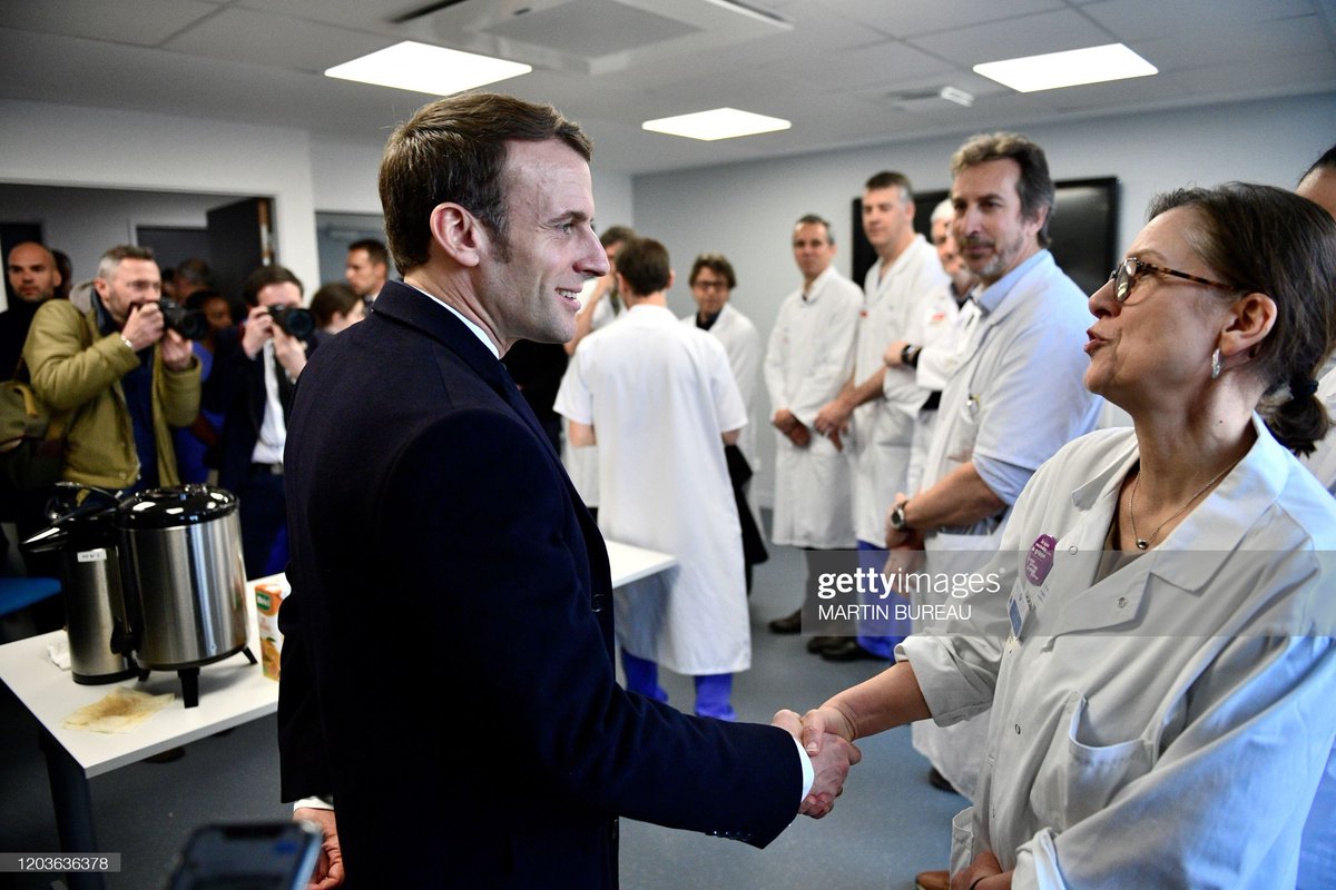 Emmanuel Macron is having a great time in the company break room!